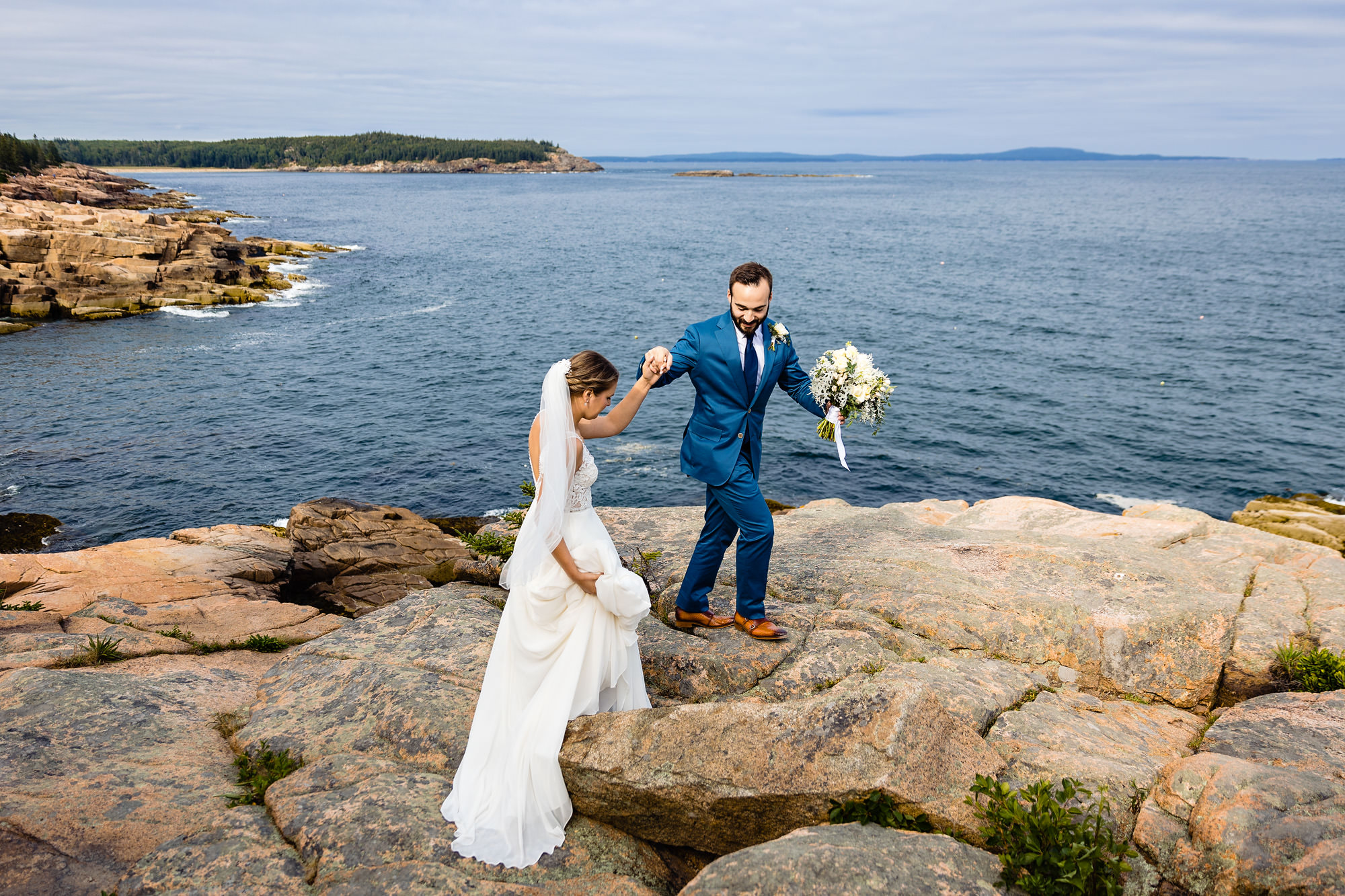 Wedding portraits on cliffs at an elopement in Acadia National Park