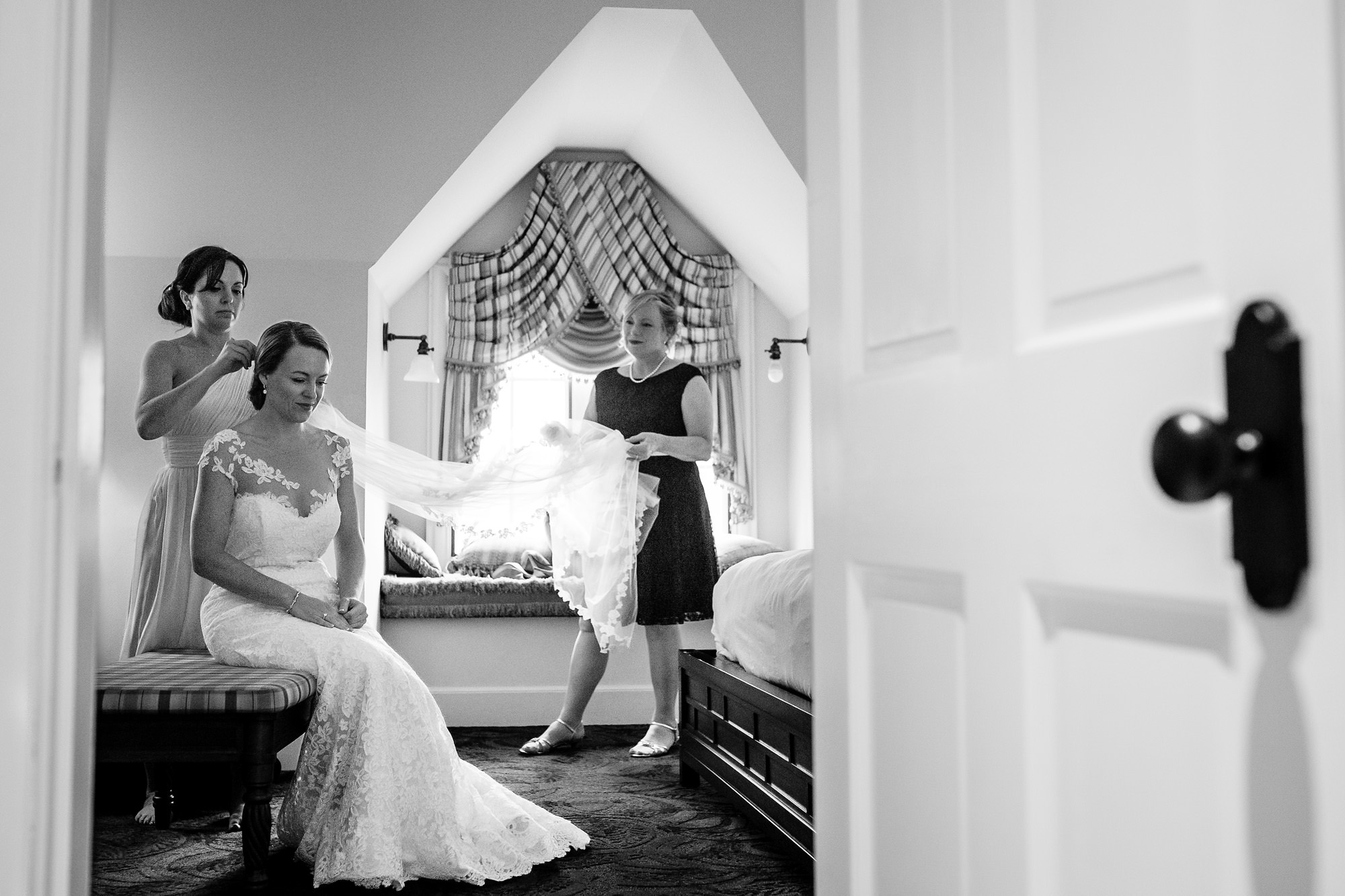 A bride getting ready for her wedding at the Harborside Hotel in Bar Harbor, Maine