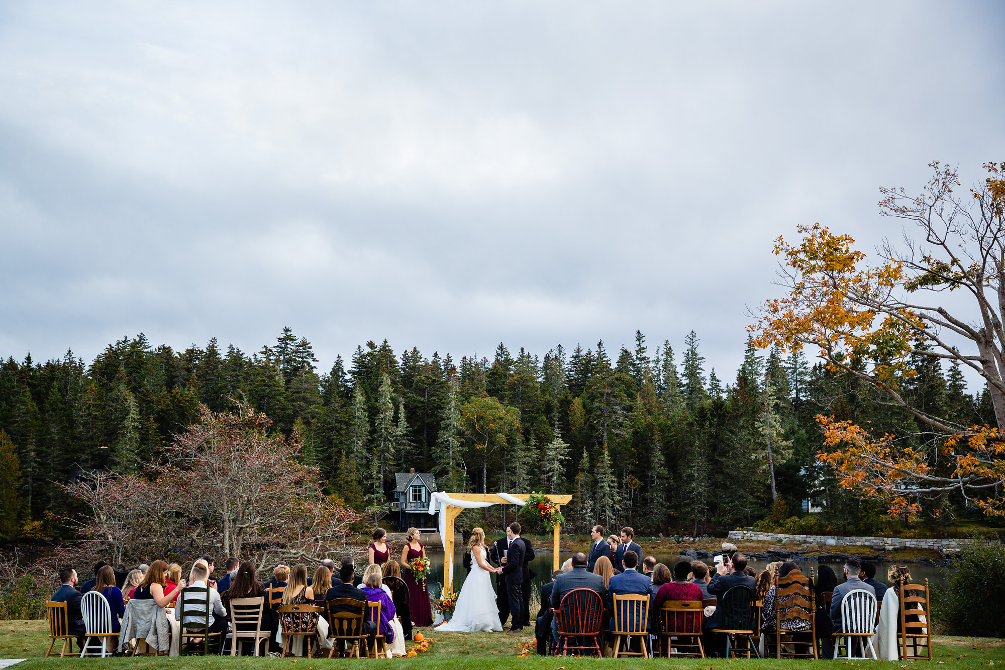 A wedding ceremony at the Causeway Club, a wedding venue in Southwest Harbor, Maine