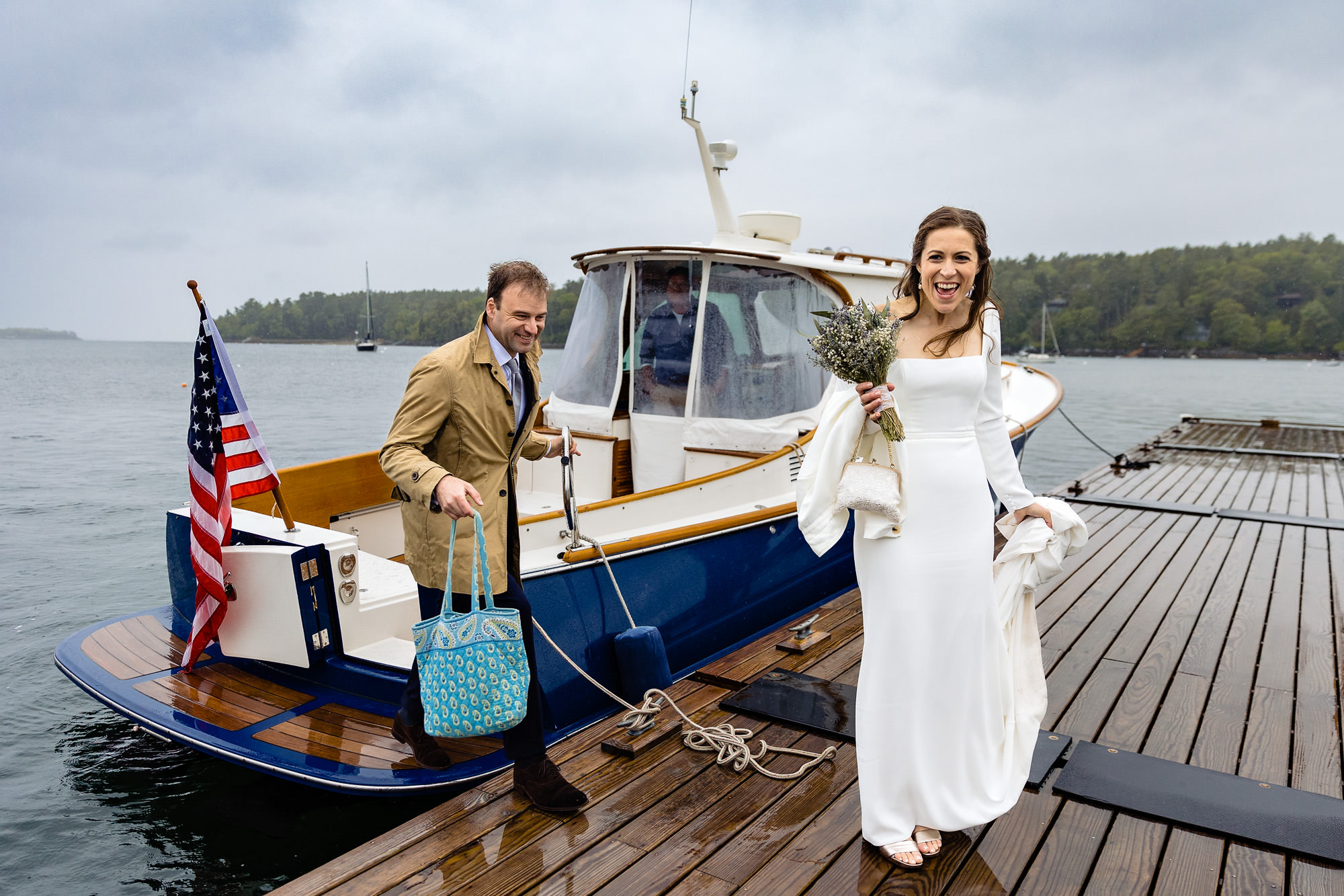 A rainy boat ride at a Boothbay Harbor Maine wedding