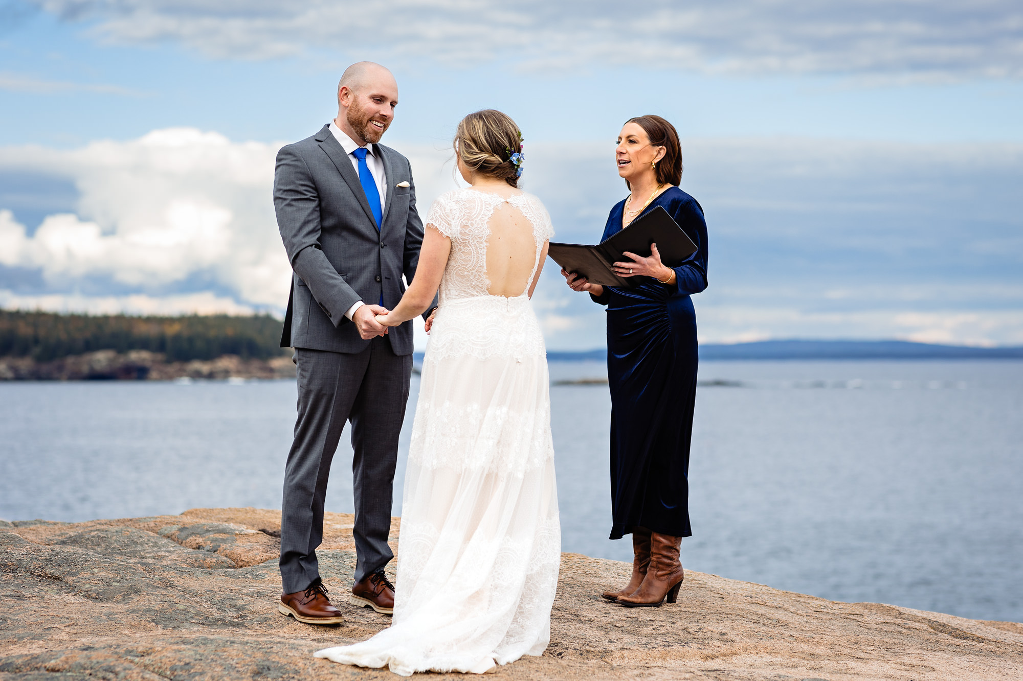 A cliffside elopement with a view of the ocean in Acadia National Park