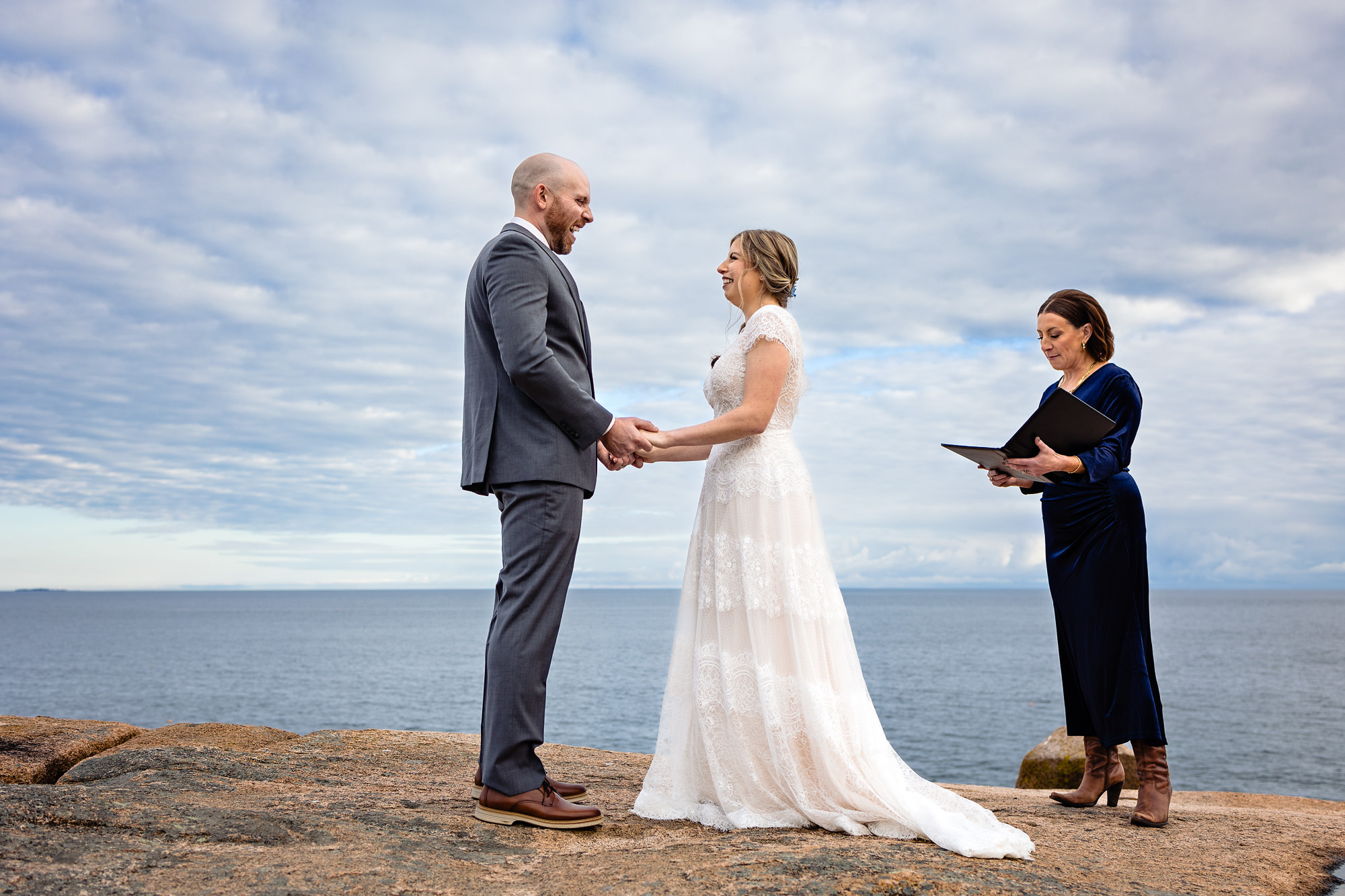 A cliffside elopement with a view of the ocean in Acadia National Park