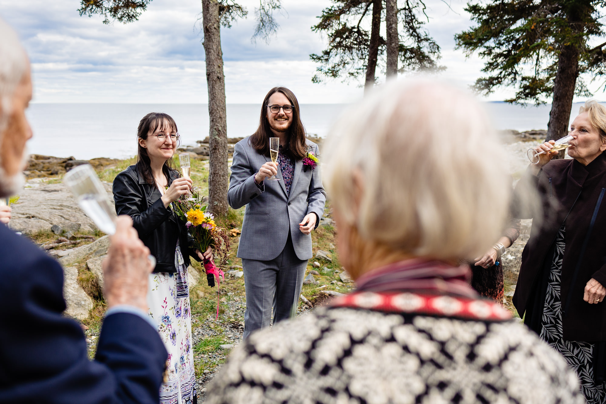 A champagne toast after an elopement ceremony at Seawall in Acadia
