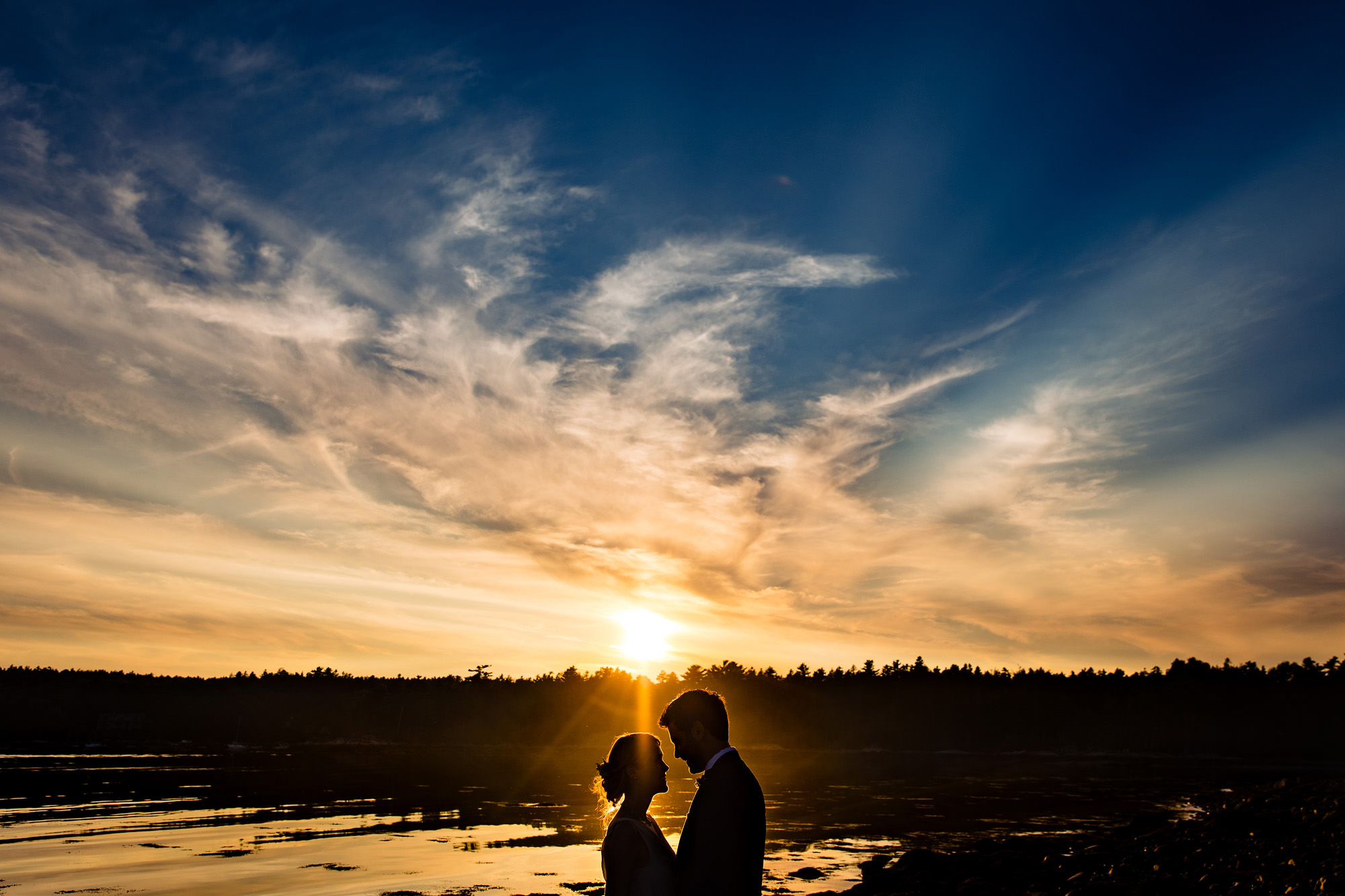 A silhouette sunset wedding portrait.
