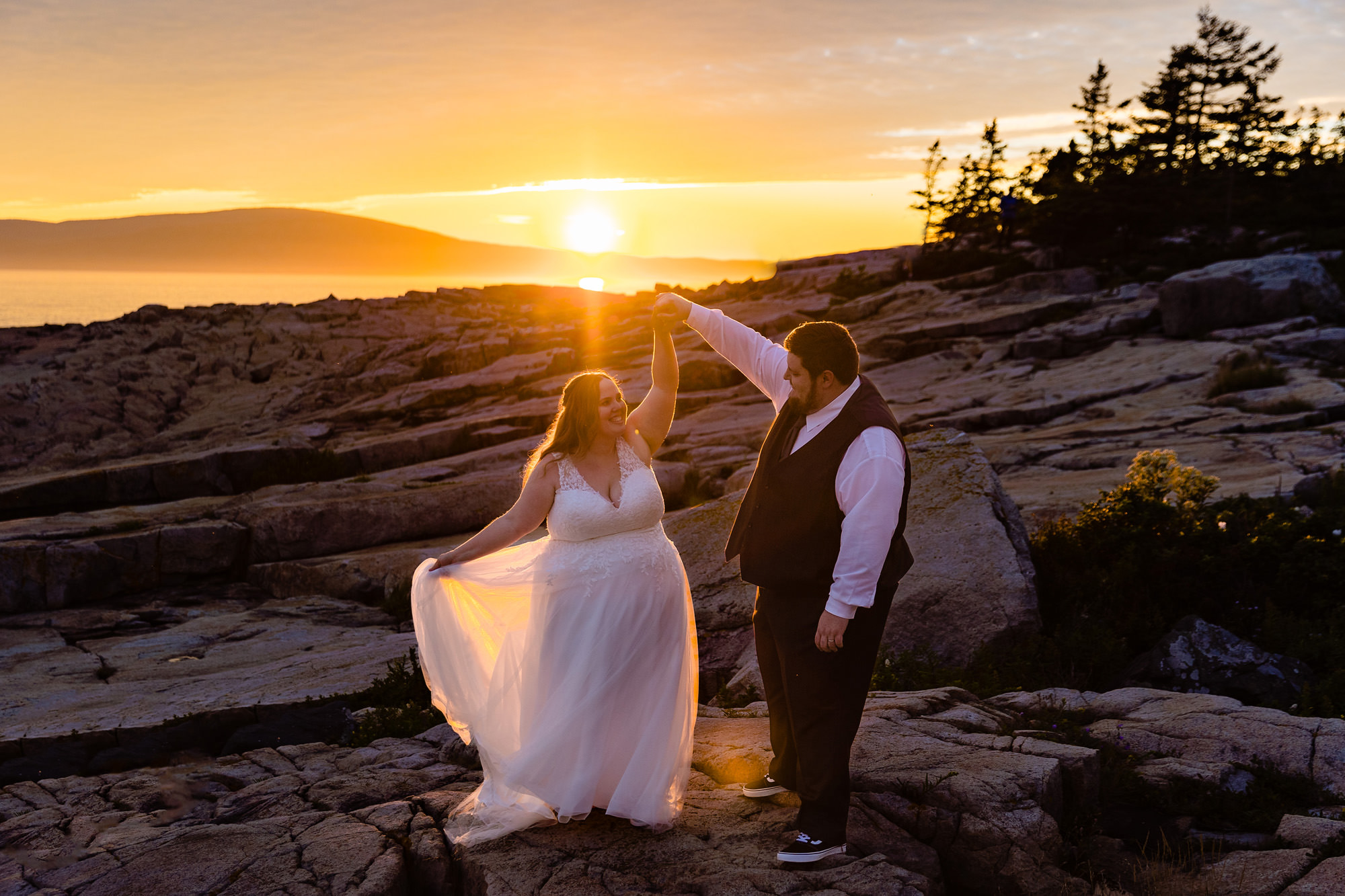 A wedding portrait at Schoodic Point at sunset.