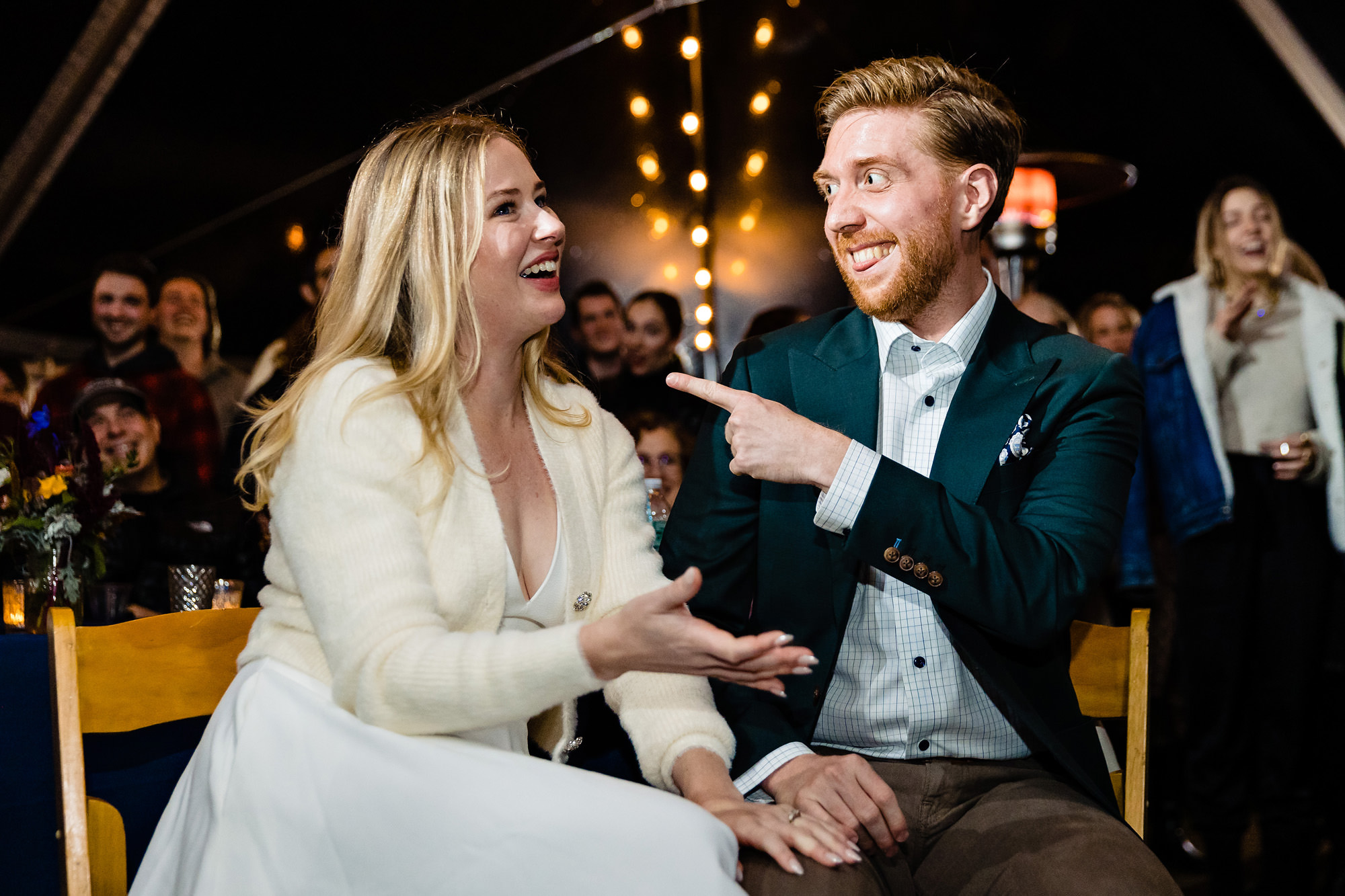 A wedding couple have a humorous interaction at a wedding rehearsal.