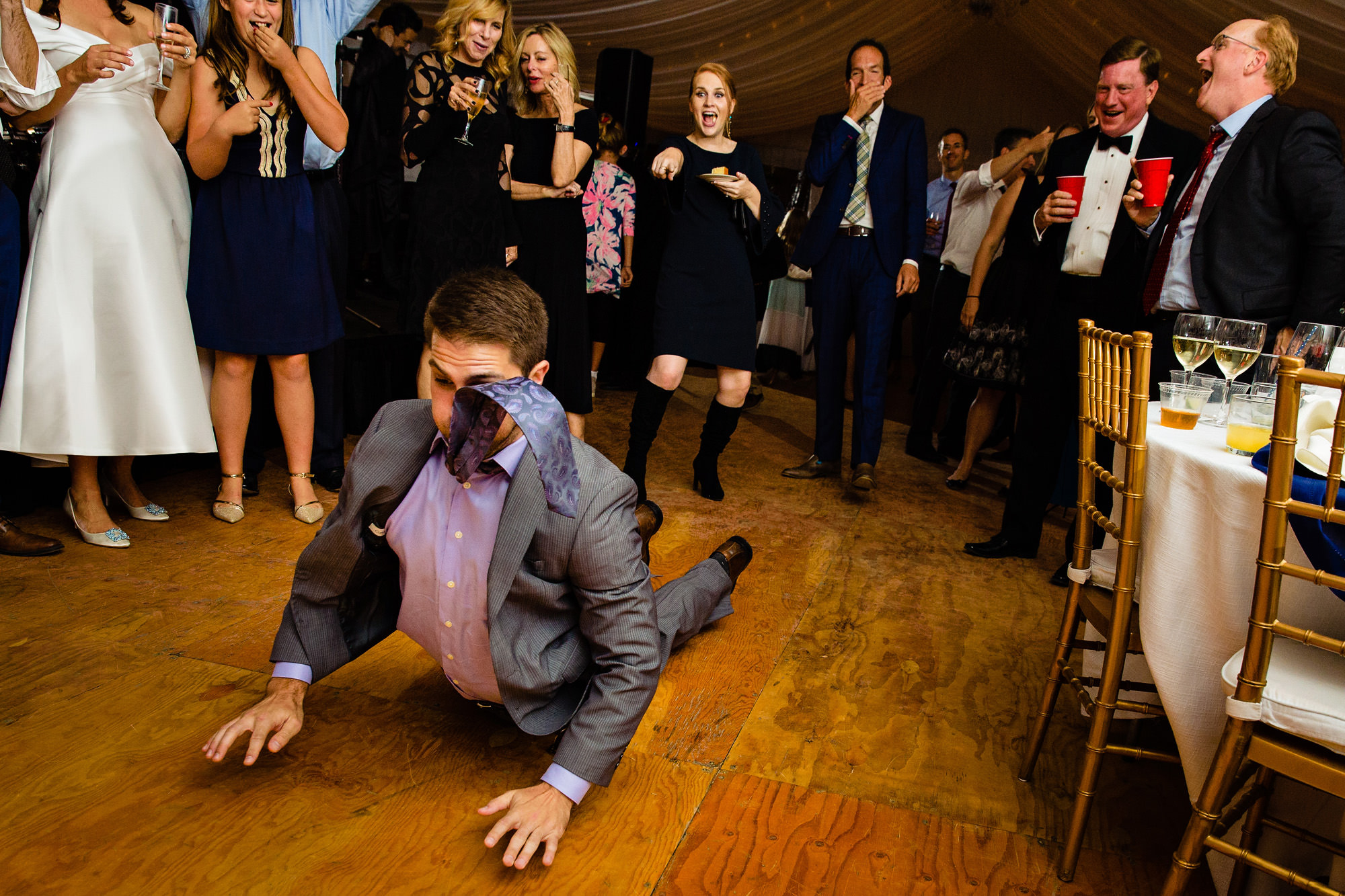 A guest does the worm on the dance floorat a Blue Hill Maine wedding