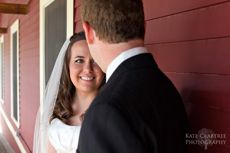 The bride and groom share a first look at the Winterport Winery wedding before their ceremony begins.