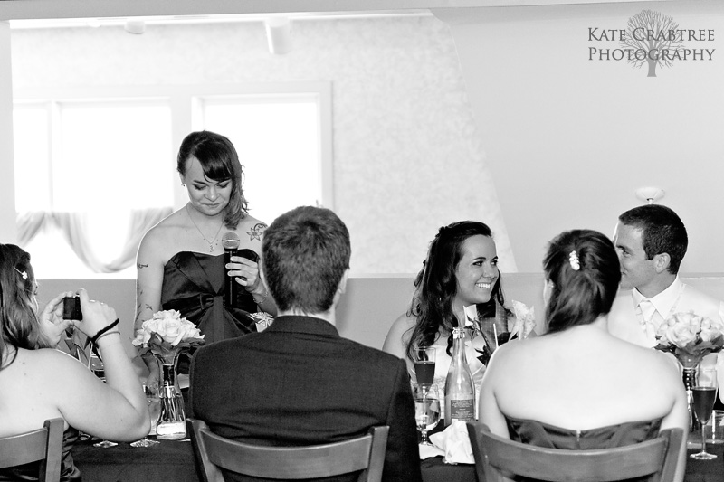 The maid of honor gives a toast after a delicious Winterport Winery feast.