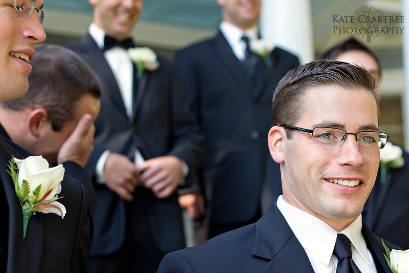 Candid photos of the groom and his groomsmen before his Bangor Maine wedding at the Penobscot Valley Country Club