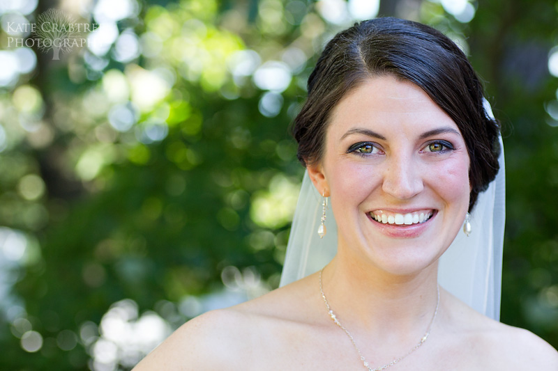 The bride poses in front of the camera in Bangor Maine