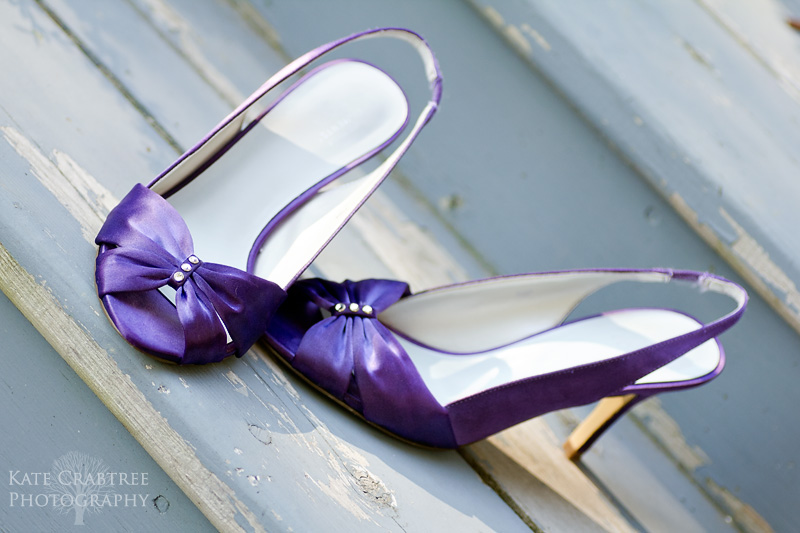 A detail shot of the bride's purple heels.