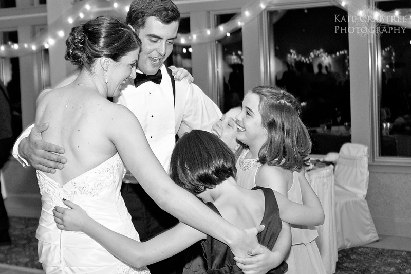 The bride and groom dance around with the kids at the Penobscot Valley Country Club in Orono Maine