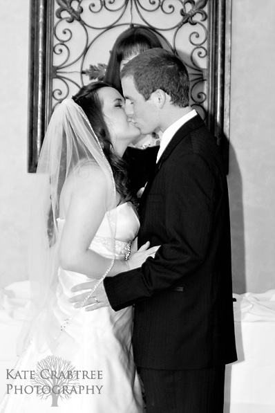 The bride and groom's first kiss at the Winterport Winery in Maine.