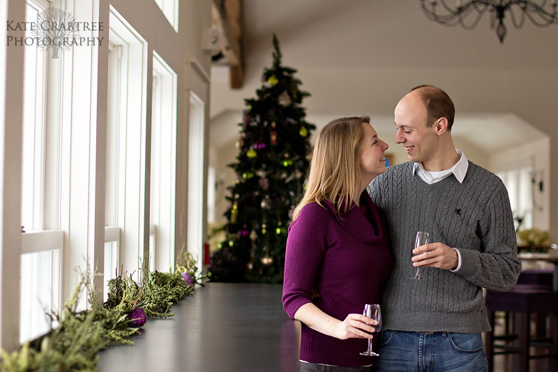Erin and Keith smile at each other during their engagement session at the Cellardoor Winery in Maine
