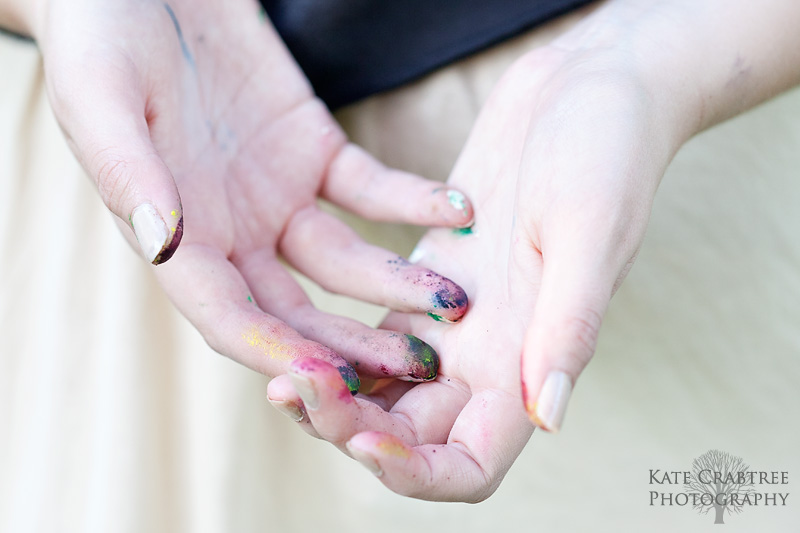 A photo of Lauren's hands covered in paint after painting in Orono Maine