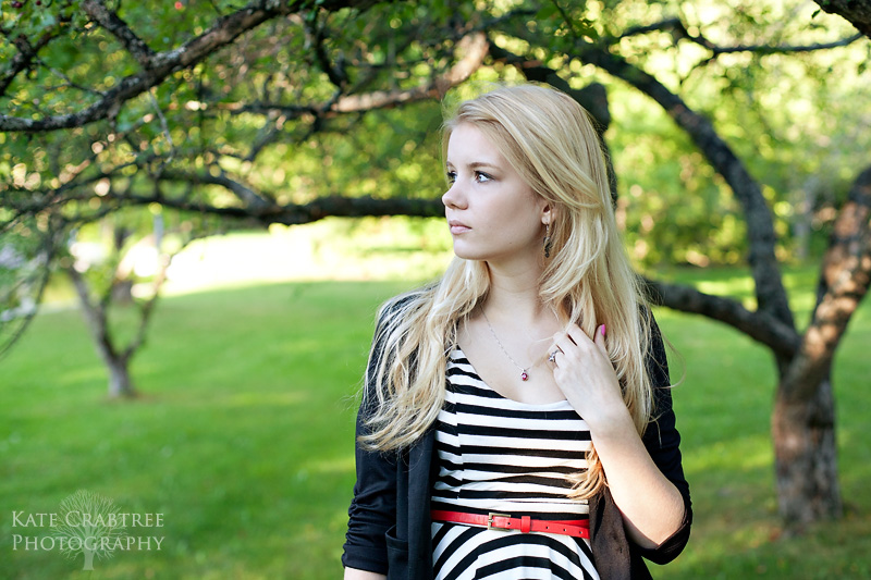 Grace Eye poses during her high school senior portrait session in Orono Maine