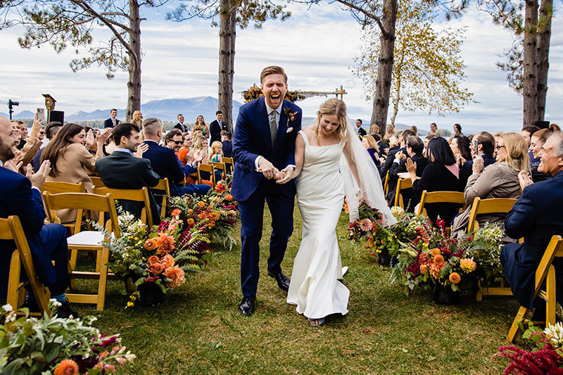 A fall wedding ceremony at New England Outdoor Center