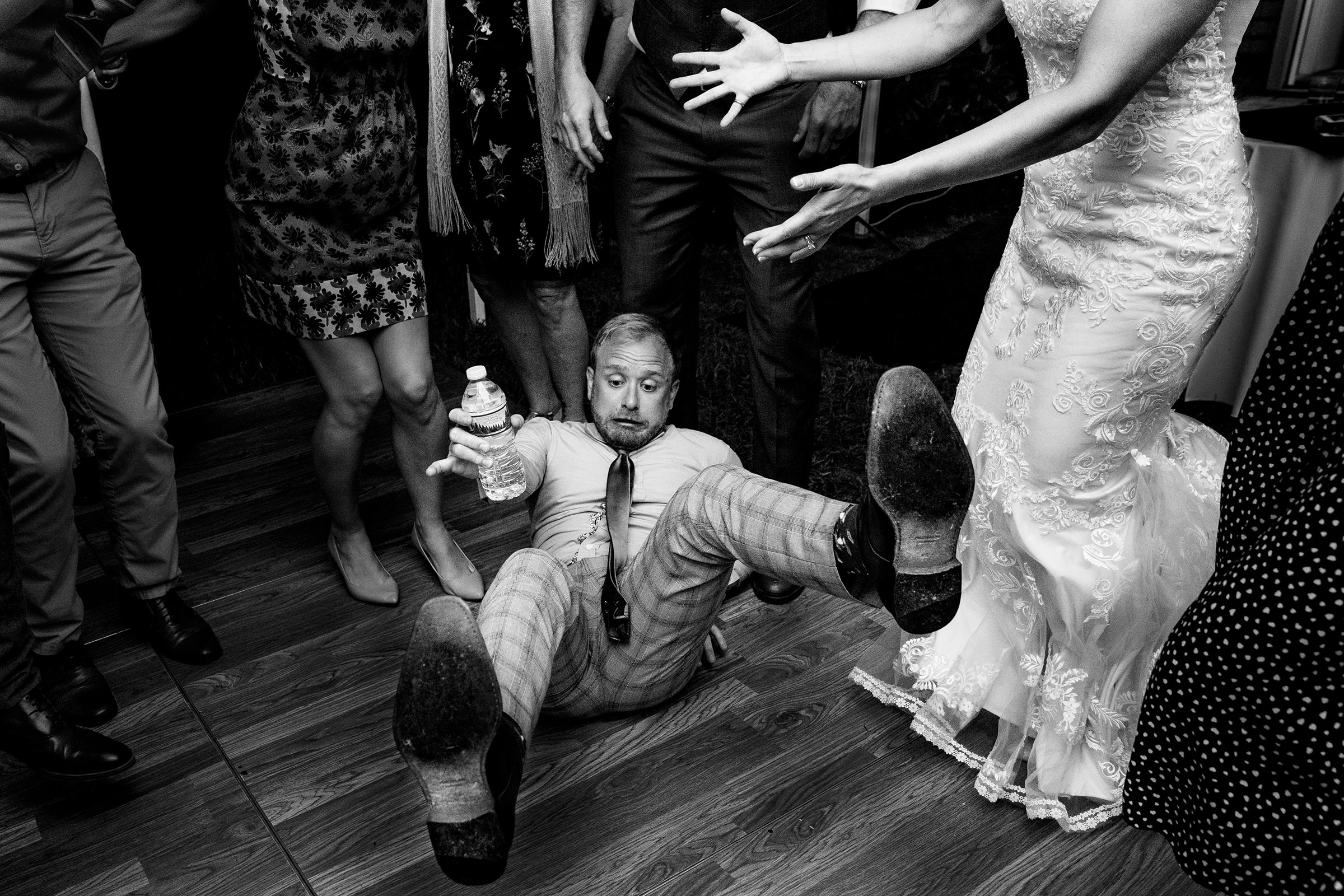 A wedding guest falls on the dance floor at a central Maine wedding.