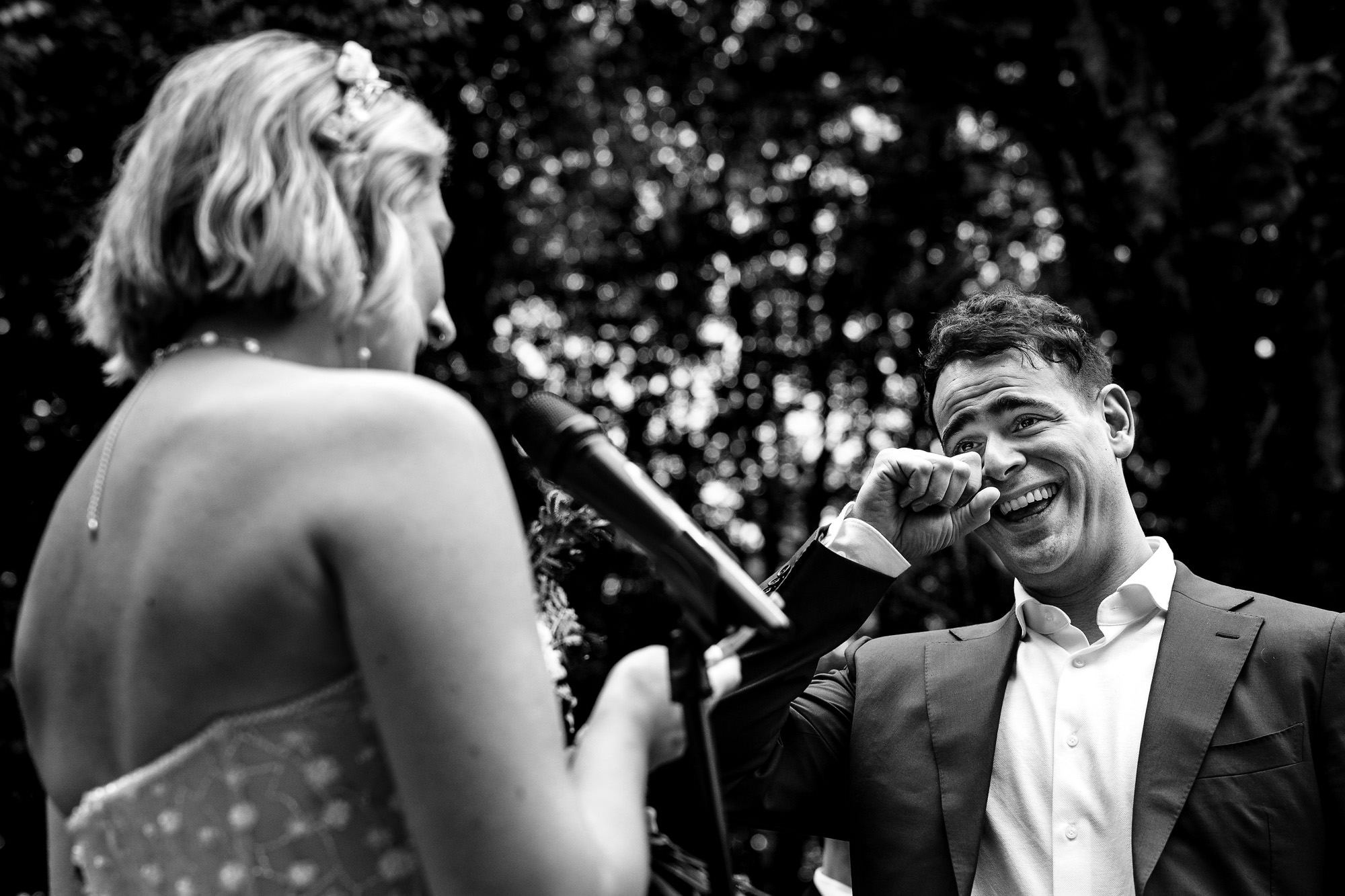 A groom cries during his wedding ceremony.