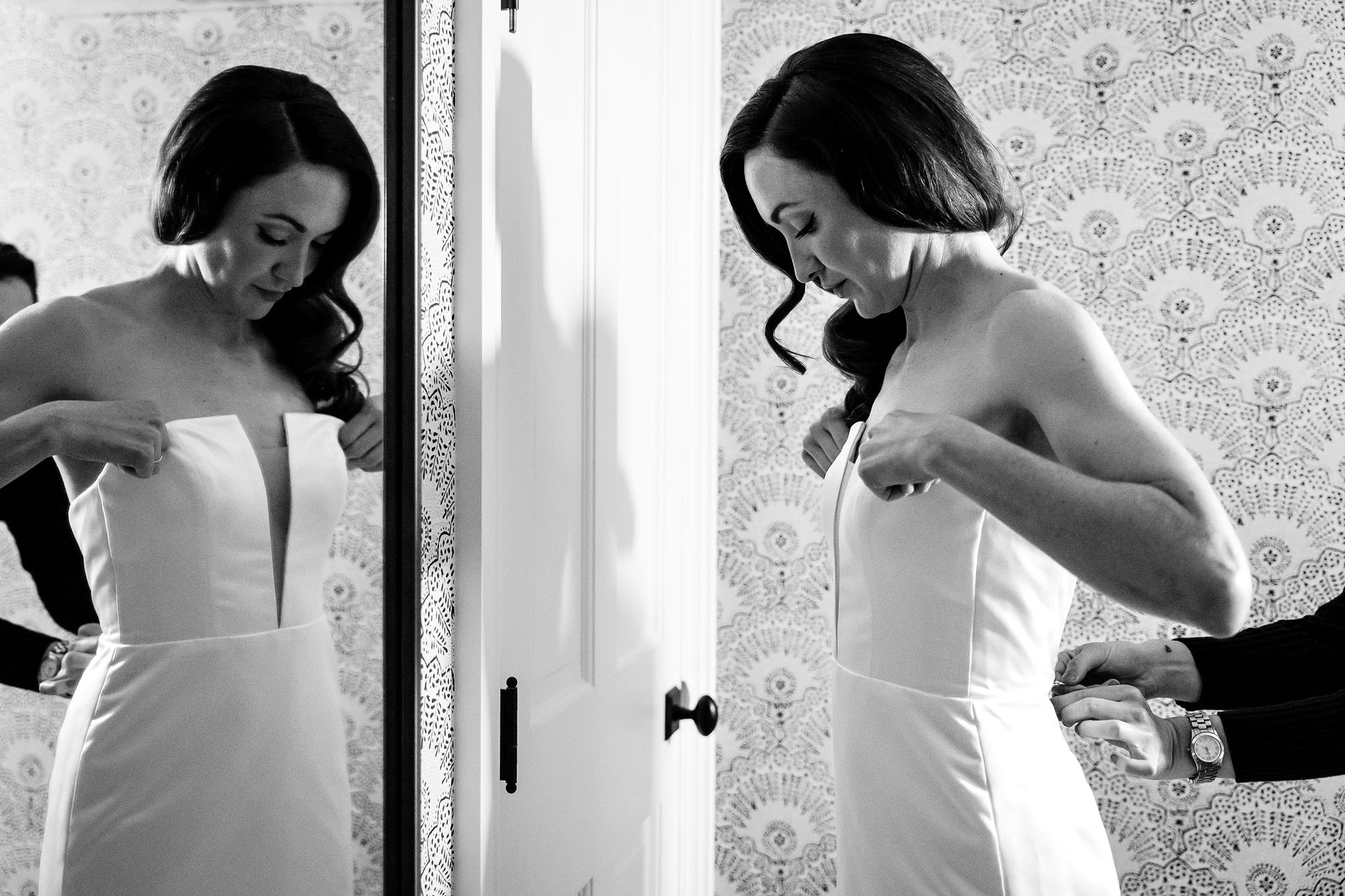 A bride gets ready at Claremont Hotel in Southwest Harbor