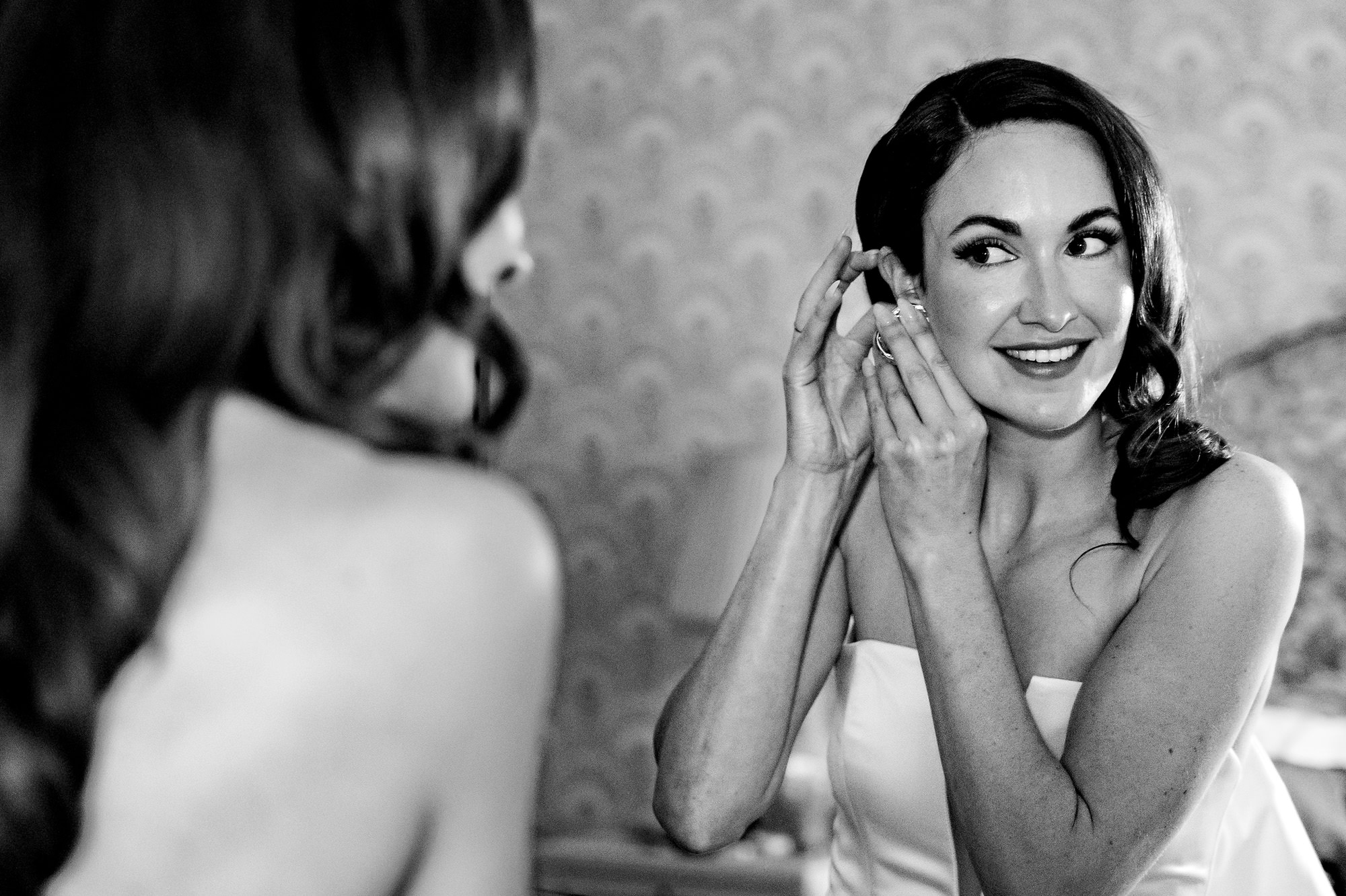 A bride gets ready at Claremont Hotel in Southwest Harbor