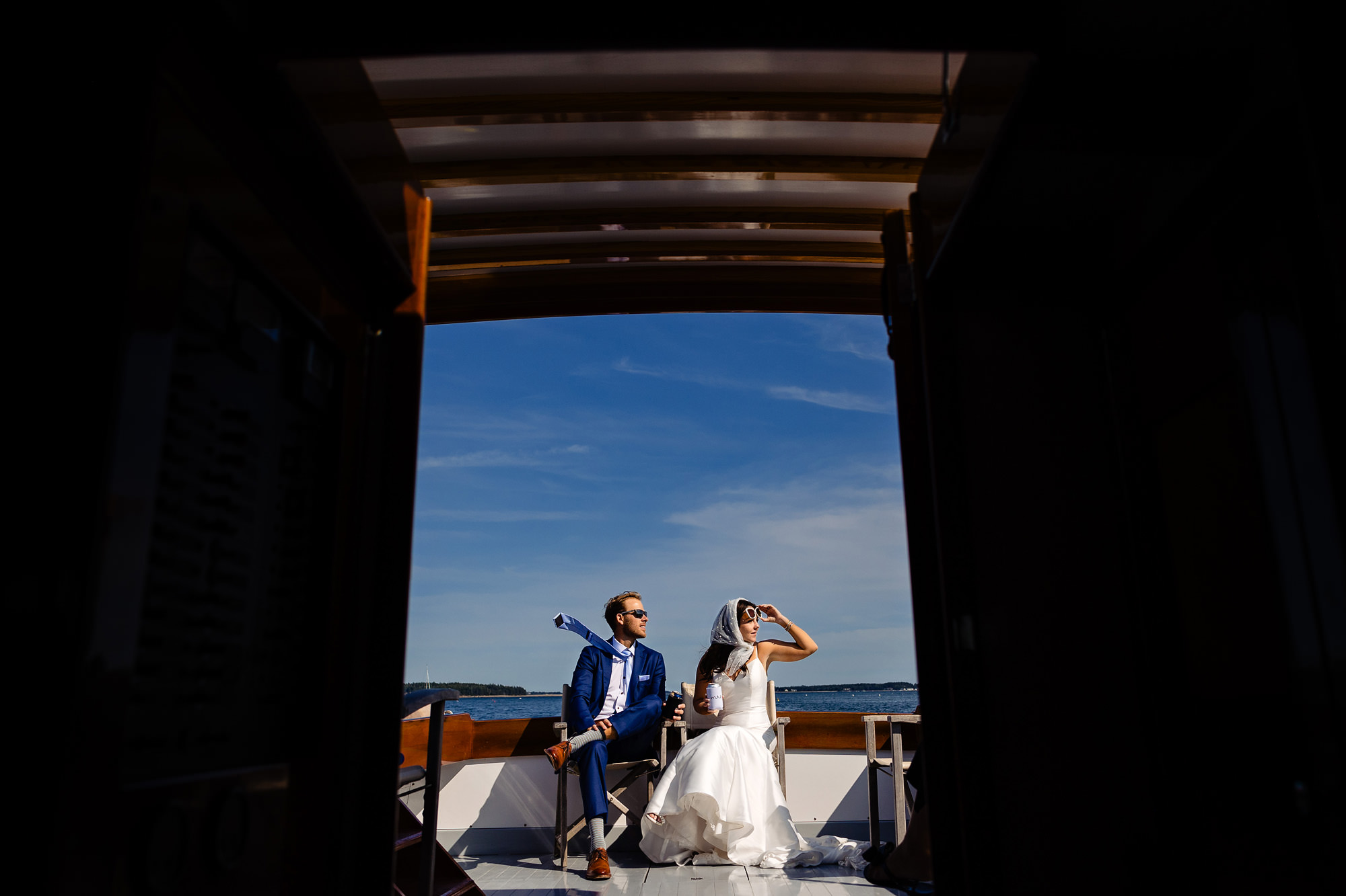 A bride and groom explore Mount Desert Island via boat for their elopement.