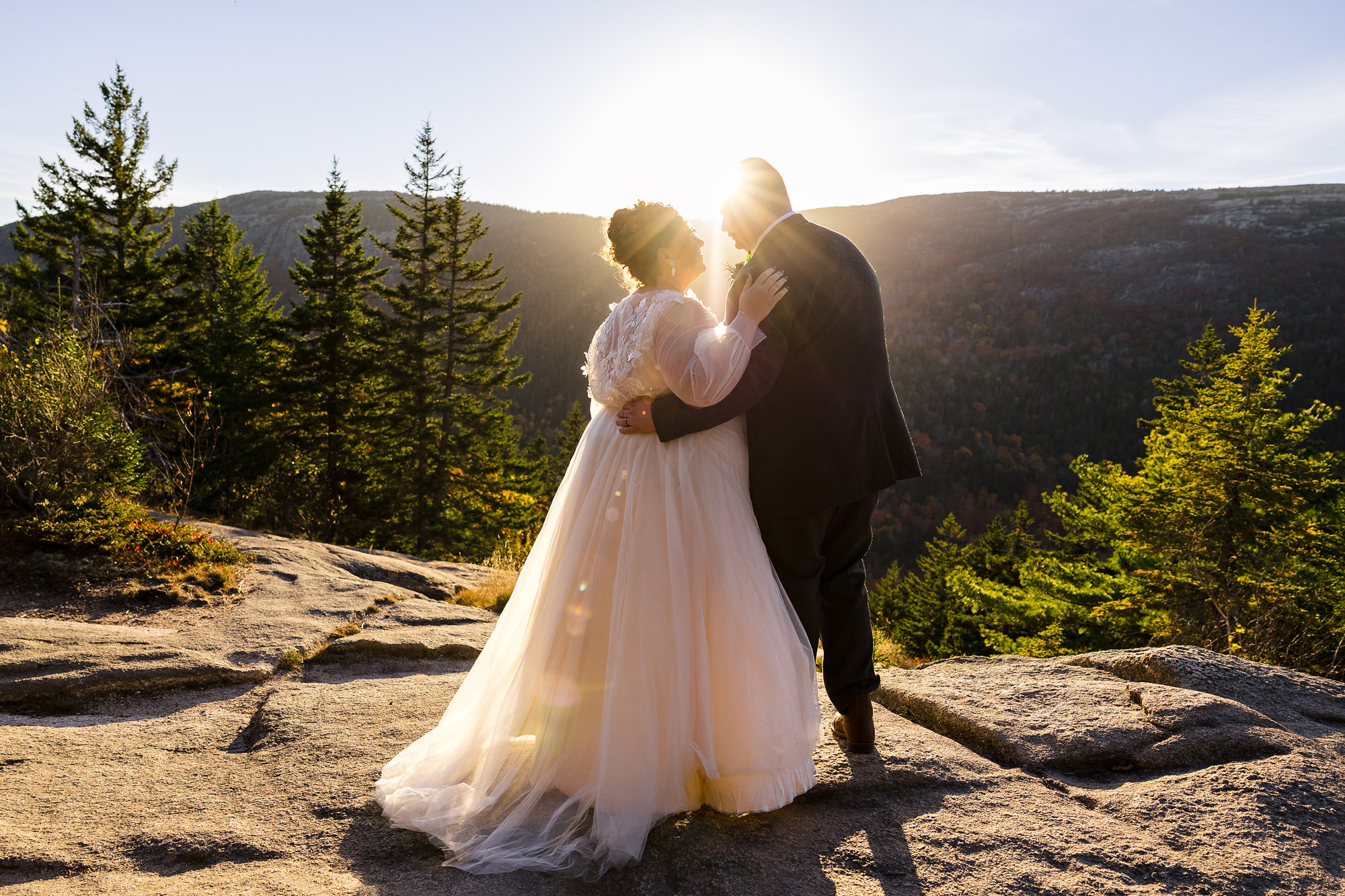 A wedding portrait on a mountain in Acadia National Park