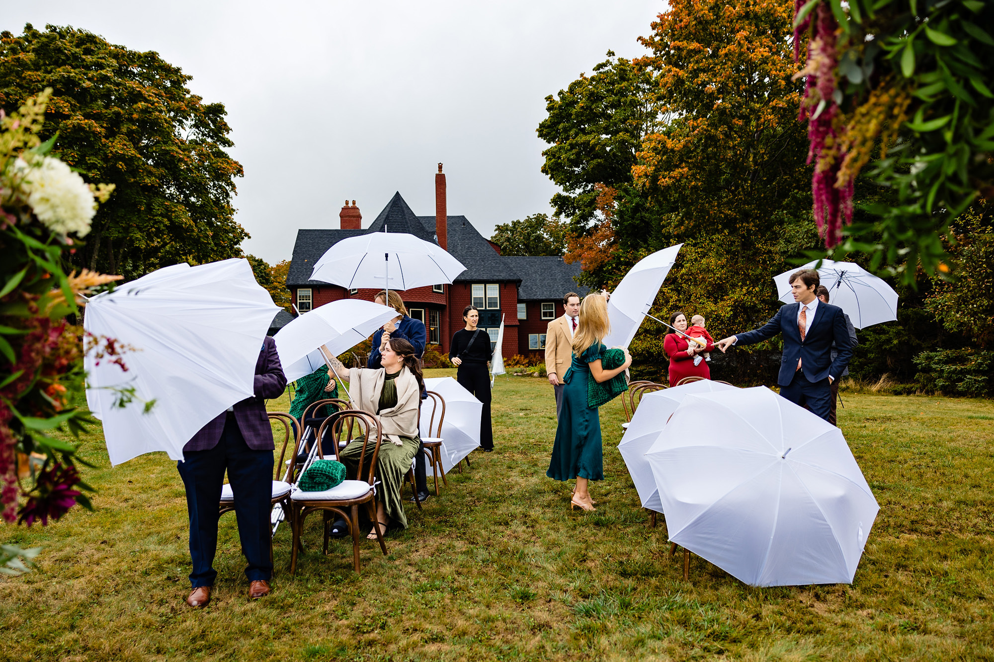 Umbrellas open for a potentially rainy wedding ceremony in Bar Harbor.