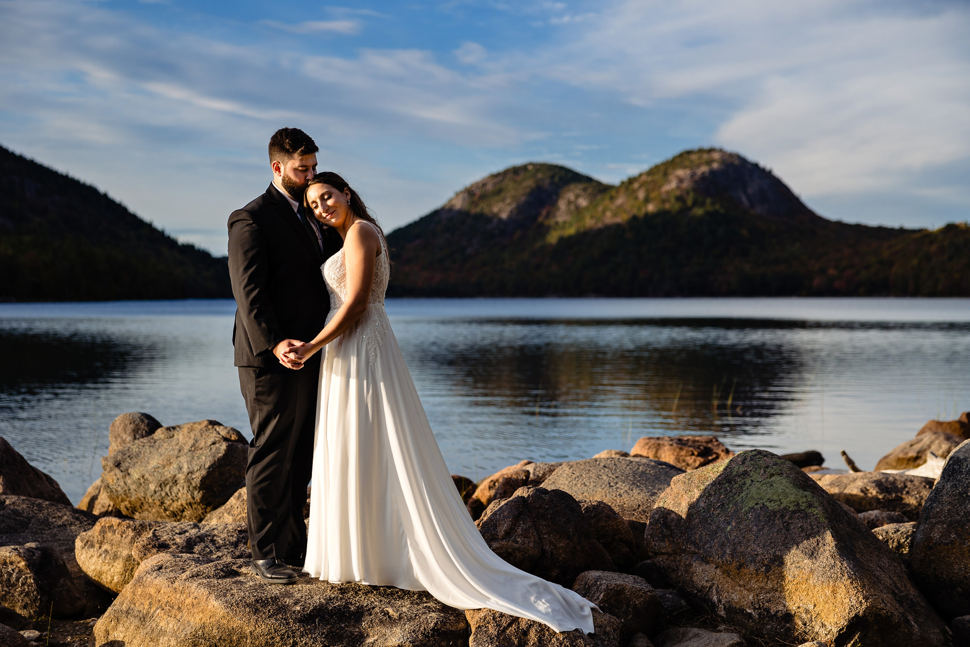 A wedding portrait of a couple at Jordan Pond in Acadia National Park